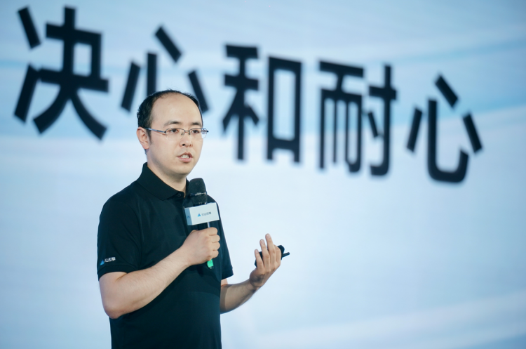 Yang Zhenyuan speaking at Volcano Engine's launch event. Image via handout.