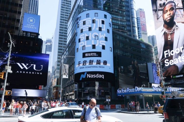 A photo of SnowPlus's branding at the Time Square in New York City. Image Source: handout