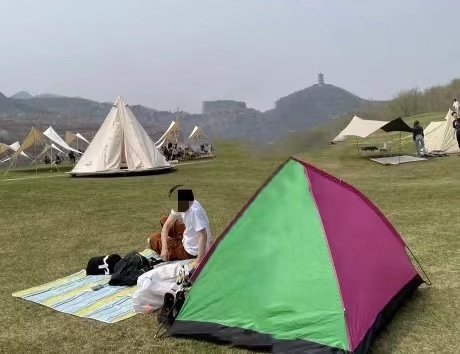 Werwer's "classic" tent stood out in the field of stylish white canopies. Photo provided by Werwer, modified with the image owner’s consent.