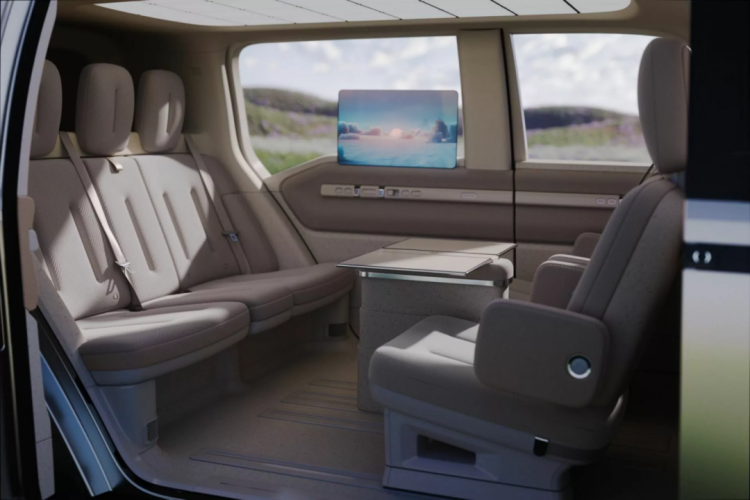 The robotaxi features rotatable front seats, foldable tables, and large screens to create a homey ambiance.